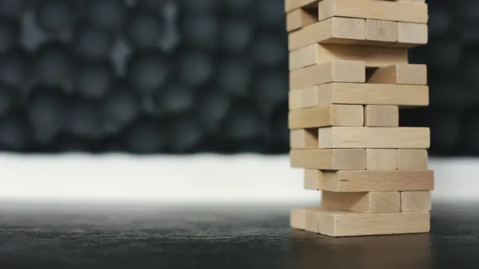 brown wooden blocks on black table